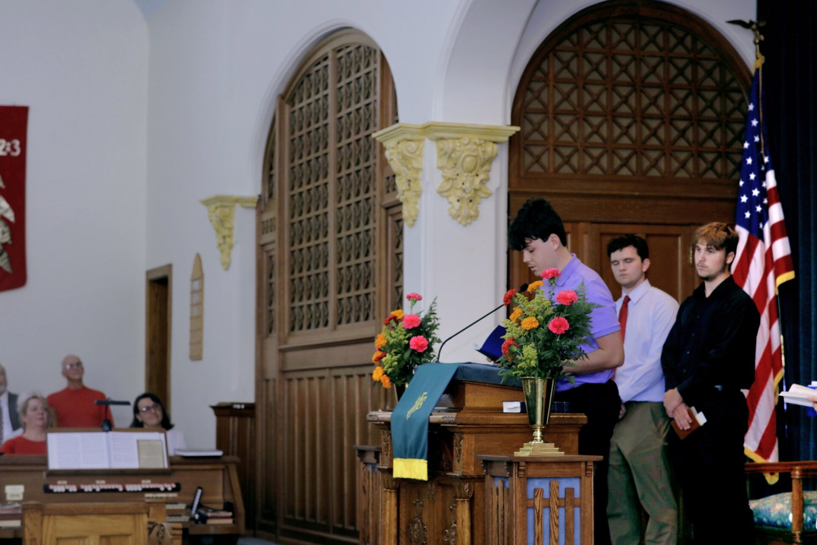 Church members gathered together in prayer